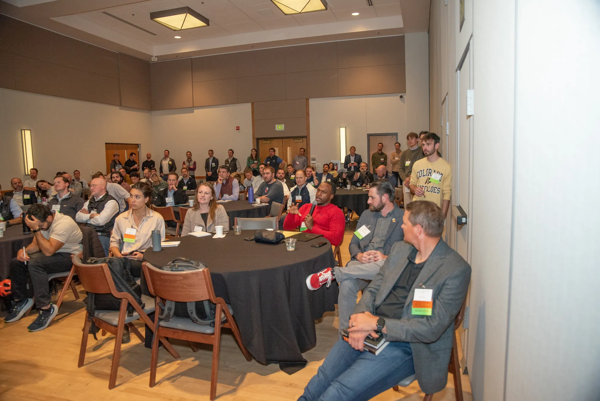 A full room of attendees seated at round tables during the inaugural Rocky Mountain ETA Conference