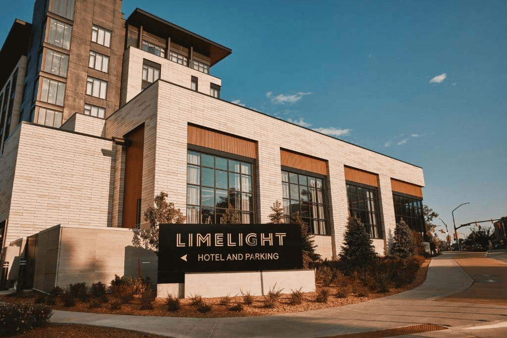 Exterior of Limelight Boulder with the hotel and parking sign in front