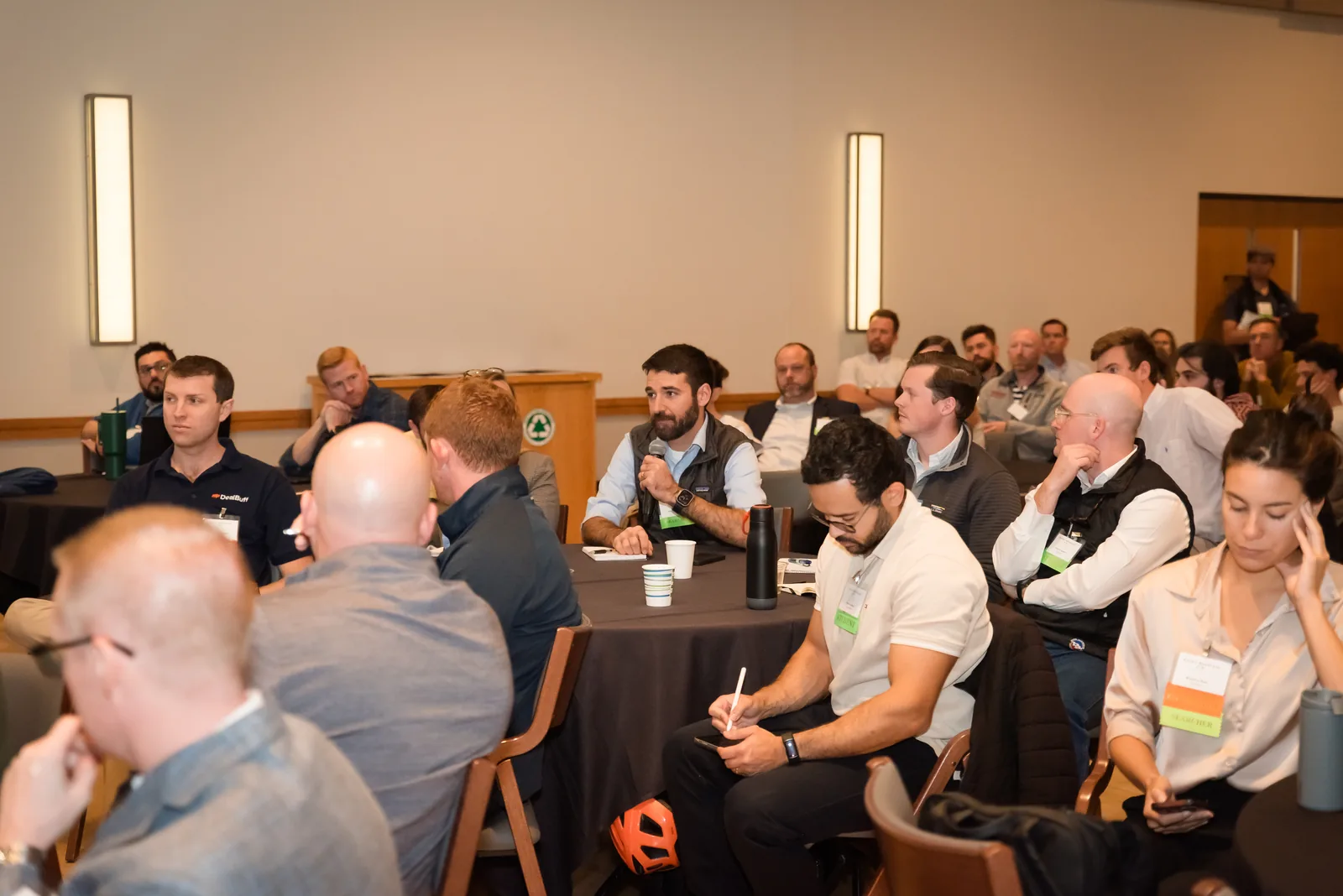 An attendee asking a question during an RMETA session